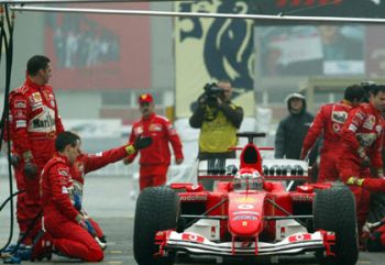 At the Bologna Motor Show test driver Andrea Bertolini took to the track of the specially constructed 'Lonsdale Arena' just after midday, and ran a series of laps in the Formula One title winning F2004 chassis