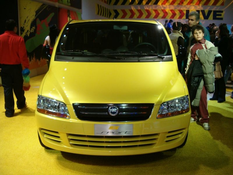 The Fiat Multipla Sport, which made its debut at the Bologna Motor Show last week, externally features a bright 'Racing Yellow' paint scheme and a Zender sports bodykit