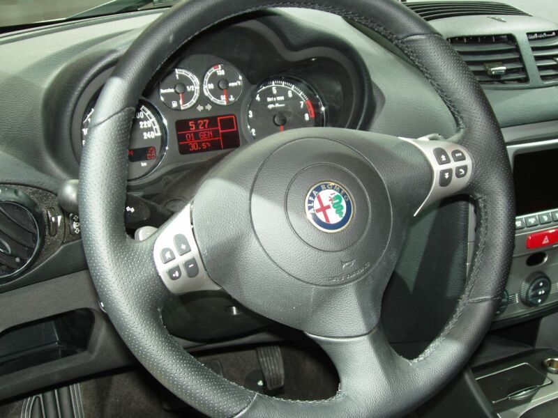 World Premiere of the facelifted Alfa Romeo 147 at the 2004 Paris Mondial de l'Automobile