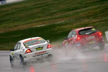 Hugh Harrison splashes around Winton Raceway during qualifying. Photo: Procar.