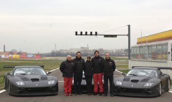 The JMB Racing team principals with the three Ferrari 575GTC cars they plan to race this season. Click here to enlarge.