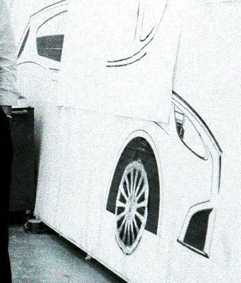 A 1:1 scale tape drawing of an Alfa Romeo, possibly a Kamal proposal. The 147 replacement uses a combination of sharp and soft curves, broadly similar in effect to the new BMW 1-series, although Alfa Romeo have been more successful