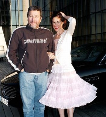 Mr. and Mrs. Philippe Starck along with the Maserati Quattroporte that escorted them to the Bibliothèque Nationale de France, Paris for the AD's 5th anniversary event