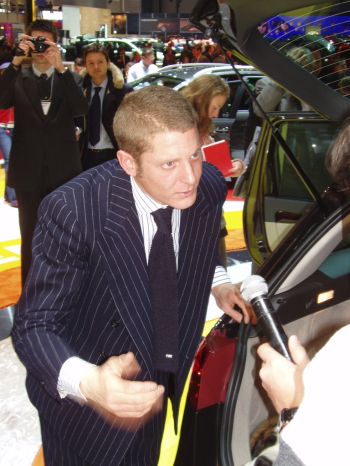 The Fiat Vice-President of Marketing Lapo Elkann, discusses the new Fiat Croma in Geneva, on Fiat's stand, which very strongly bears the realisation of his new stylistic direction