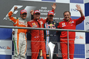 KIMI RAIKKONEN, STEFANO DOMENICALI, SEBASTIEN VETTEL AND GIANCARLO FISICHELLA ON THE PODIUM OF THE 2009 BELGIAN GRAND PRIX, SPA