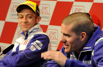 Valentino Rossi and Jorge Lorenzo finished second and third in the season-ending Grand Prix of Valencia on Sunday afternoon, the ninth time the pair have shared the podium this season. It ensured that Yamaha won the Triple Crown for the second year running after Rossi took the Riders' title, Fiat Yamaha the Teams' and Yamaha the Constructors'.