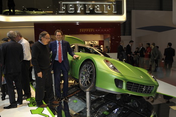 SERGIO MARCHIONNE AND JOHN ELKANN INSPECT THE FERRARI 599 HY-KERS PROTOTYPE AT THE 2010 GENEVA MOTOR SHOW