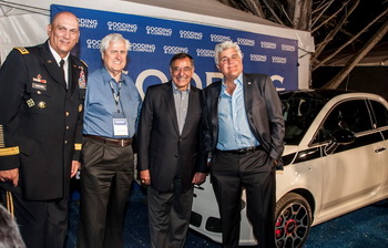 Pictured from left to right: Chief of Staff of the United States Army General Raymond Odierno, new owner, Secretary of Defence Leon Panetta, Jay Leno with the 2012 Fiat 500 Prima Edizione sold to benefit the Fisher House. Image copyright and courtesy of Gooding & Company. Photo by Eric Fairchild.