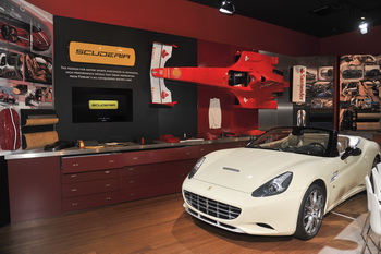 The Ferrari display in Paris is showcasing its new and advanced supercar destined carbon fibre chassis as well as the five sports cars that make up the current range, each of which represents the present generation of its 8- and 12-cylinder models. 