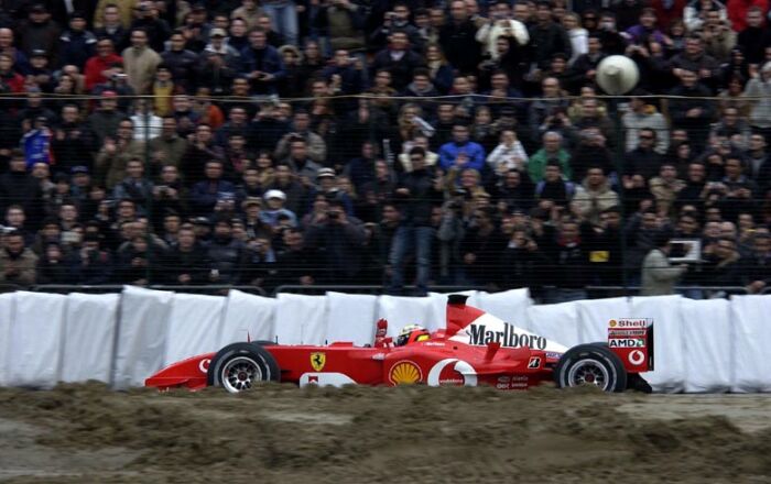 Luciano Burti demonstrates Michael Schumacher's F1 World Championship winning Ferrari F2002 at Bologna