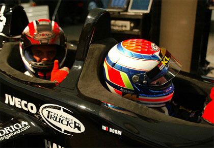 the unusual Minardi two seat Formula One car taking passengers on demonstration runs in Bologna