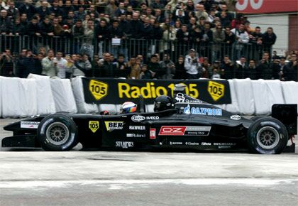 the Minardi two seat Formula One car taking passengers on demonstration runs in Bologna