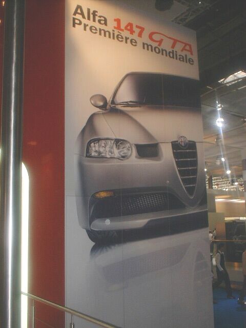 Alfa 147 GTA launch poster on the Alfa Romeo stand