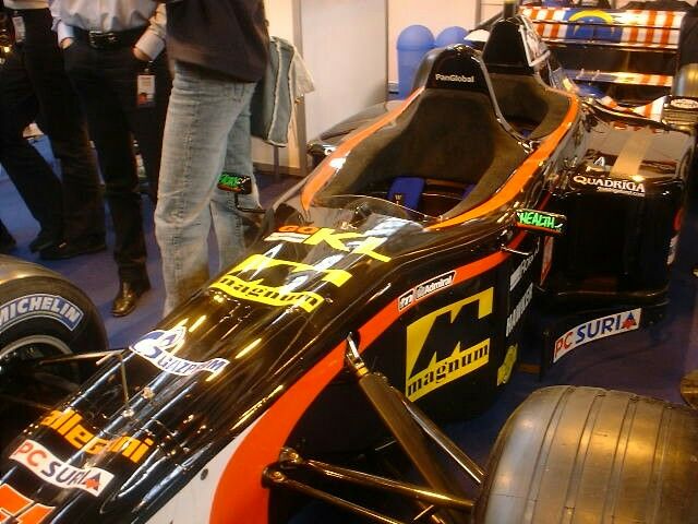 Minardi's unusual two seater F1 car at the 2003 Autosport International Motorsports Show at the Birmingham NEC