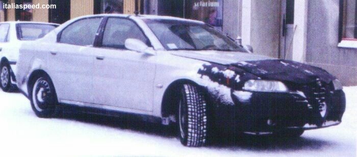 lightly disguised Alfa Romeo 166 restyling undergoing trials