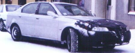 click here to enlarge this image of the facelifted Alfa 166