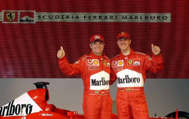 Michael Schumacher and Rubens Barrichello with the new Ferrari F2003-GA