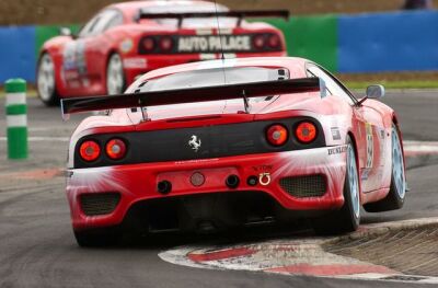 the no 88 TMC Ferrari 360 follows the similar Autopalace car at Magny-Cours yesterday