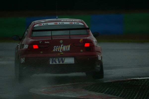 Nicola Larini on his way to pole position during the rain soaked qualifying session in Magny-Cours