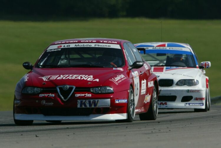 Paolo Ruberti's Alfa Romeo 156GTA is chased by race 2 winner Andy Priaulx's BMW 320i