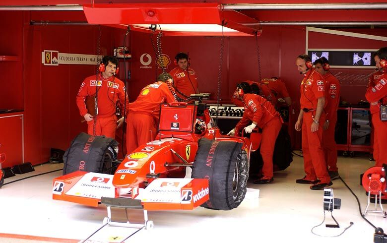 Rubens Barrichello sits in his Ferrari awaiting his next qualifying run