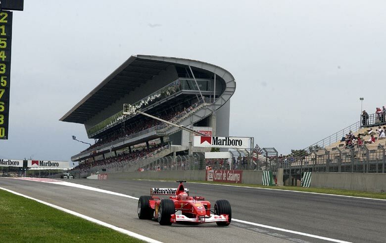 Michael Schumacher exiting the pits in his Ferrari