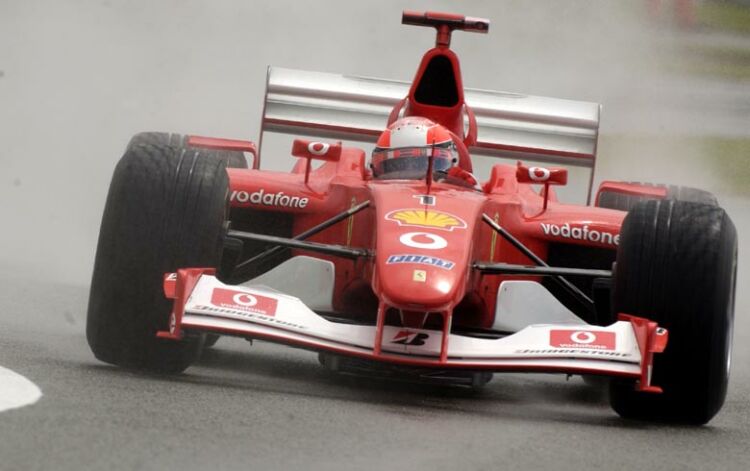 Michael Schumacher at the wheel of his Ferrari in the wet