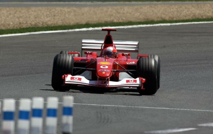 Michael Schumacher on his way to clinching a record equalling fifth world title at the French Grand Prix