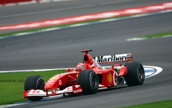 Michael Schumacher powers his Ferrari around the sweeping newly revised Hockenheim track which generally was not well received