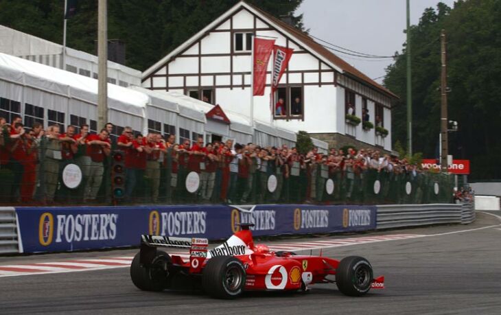 Michael Schumacher in his Ferrari at a track where he made his Grand Prix debut in 1991 and took his first Grand Prix career win in 1992