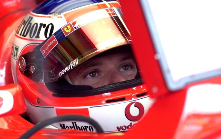 Rubens Barrichello watches the monitors during qualifying