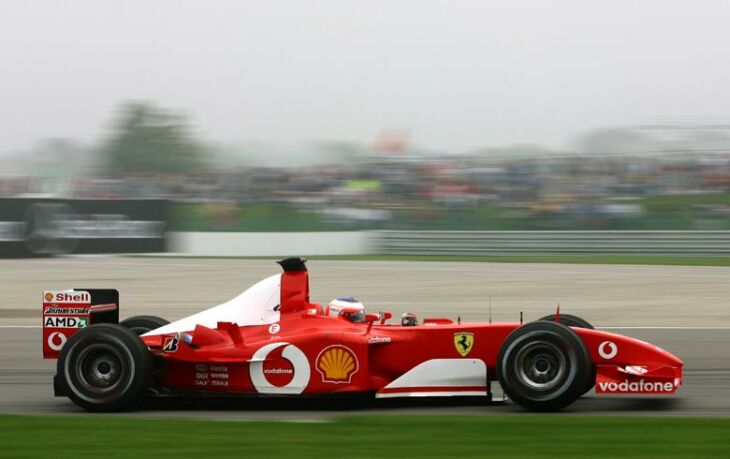 Rubens Barrichello was handed a lucky fifth career victory at Indianapolis