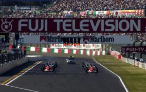 Michael Schumacher leads away at the start of the 2002 Japanese Grand Prix