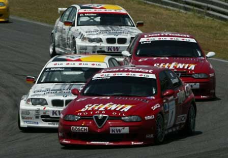 Fabrizio Giovanardi and Nicola Larini in their Nordauto Alfa Romeo 156 GTA's fend off the BMWs of Jorg and Dirk Muller